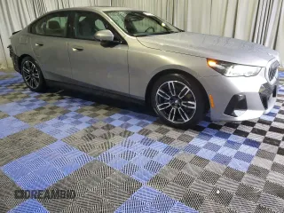2024 BMW 5 Series 530i with VIN WBA43FJ0XRCS74003, listed as a Copart auction lot 43703145 with 7,942 mi miles and Clean Title. Bid and sale history available at carsss.com. Image 4.