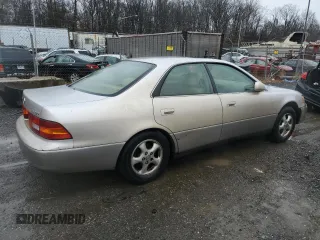 1999 Lexus ES 300 Luxury Sport Sdn with VIN JT8BF28GXX5067205, listed as a Copart auction lot 83018394 with 170,573 mi miles and Salvage Title. Bid and sale history available at carsss.com. Image 3.