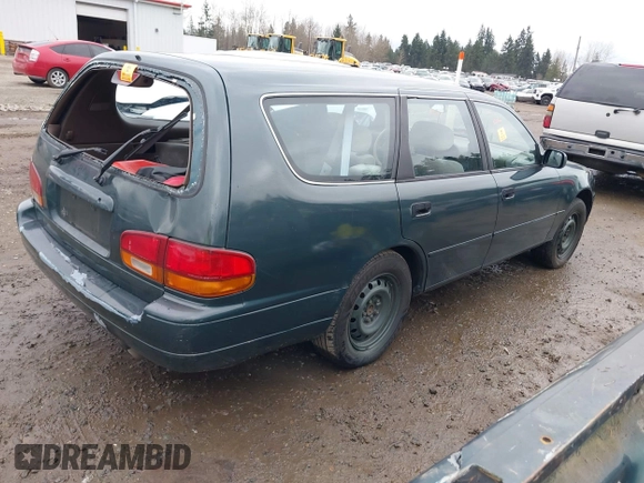 1996 Toyota Camry LE z VIN 4T1EF12K9TU116427, wystawiony jako IAAI lot #38696498 z przebiegiem 242 599 mil mil oraz . Historia ofert i sprzedaży dostępna na DreamBid. Obrazek 4.