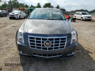 2013 Cadillac CTS Premium с VIN 1G6DP5E34D0151591, выставлен на аукционе Copart как лот 63668325 с пробегом 59 477 миль миль и Списание • Salvage title. История ставок и продаж доступна на DreamBid. Изображение 5.
