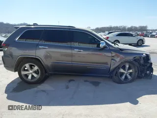 2015 Jeep Grand Cherokee Overland with VIN 1C4RJECT2FC648292, listed as a IAAI auction lot 41806402 with 116,766 mi miles. Bid and sale history available at carsss.com. Image 14.