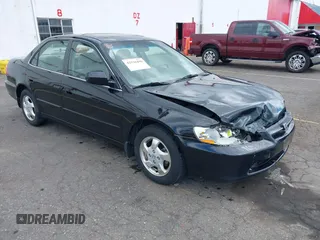 1999 Honda Accord EX z VIN JHMCG5653XC057759, wystawiony jako IAAI lot #42316498 z przebiegiem 111 246 mil mil oraz . Historia ofert i sprzedaży dostępna na DreamBid. Obrazek 1.