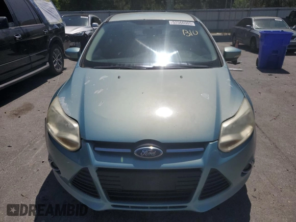 2012 Ford Focus SE with VIN 1FAHP3F29CL428201, listed as a Copart auction lot 52566905 with 209,909 mi miles and Salvage title. Bid and sale history available at DreamBid. Image 5.