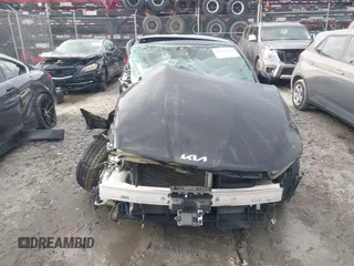 2022 Kia K5 GT-Line z VIN 5XXG64J28NG088578, wystawiony jako IAAI lot #41933138 z przebiegiem 71 071 mil mil oraz . Historia ofert i sprzedaży dostępna na DreamBid. Obrazek 12.