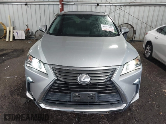 2016 Lexus RX 350 z VIN 2T2BZMCA5GC008830, wystawiony jako IAAI lot #42459060 z przebiegiem 121 062 mil mil oraz . Historia ofert i sprzedaży dostępna na DreamBid. Obrazek 12.