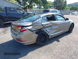 2013 Kia Optima SX with VIN 5XXGR4A68DG234678, listed as a IAAI auction lot 42539462 with 136,756 mi miles and . Bid and sale history available at DreamBid. Image 4.
