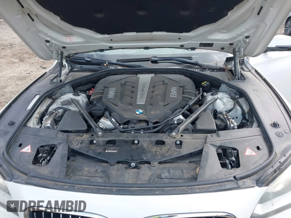 2015 BMW 7 Series 750Li with VIN WBAYE8C54FD780951, listed as a IAAI auction lot 41813038 with 103,131 mi miles. Bid and sale history available at carsss.com. Image 10.