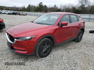 2021 Mazda CX-5 Sport with VIN JM3KFABM7M1304656, listed as a Copart auction lot 87547125 with 72,785 mi miles and Salvage Title. Bid and sale history available at carsss.com. Image 1.