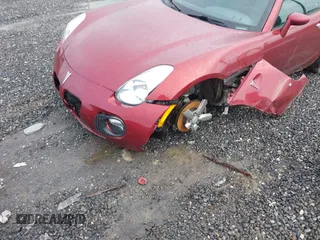 2009 Pontiac Solstice GXP z VIN 1G2MG35XX9Y102204, wystawiony jako IAAI lot #42255138 z przebiegiem 106 472 mil mil oraz . Historia ofert i sprzedaży dostępna na DreamBid. Obrazek 6.