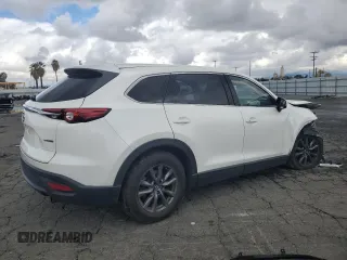2021 Mazda CX-9 Touring with VIN JM3TCACY5M0527069, listed as a Copart auction lot 43014655 with 0 mi miles and Salvage Title. Bid and sale history available at carsss.com. Image 3.