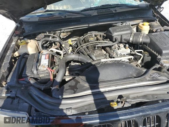 2000 Jeep Grand Cherokee Laredo with VIN 1J4G258S5YC193875, listed as a Copart auction lot 74731704 with Not provided miles and Salvage title. Bid and sale history available at DreamBid. Image 12.