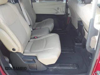 2021 Toyota Sienna XLE z VIN 5TDYRKEC2MS028134, wystawiony jako IAAI lot #42152640 z przebiegiem 107 427 mil mil oraz . Historia ofert i sprzedaży dostępna na DreamBid. Obrazek 8.