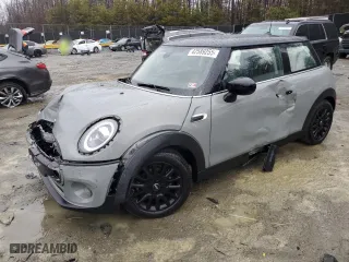 2021 MINI Hardtop 2 Door Cooper with VIN WMWXR3C04M2N98103, listed as a Copart auction lot 42589255 with 61,317 mi miles and Salvage Title. Bid and sale history available at carsss.com. Image 1.
