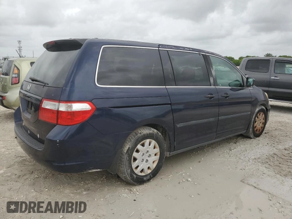2007 Honda Odyssey LX with VIN 5FNRL382X7B054326, listed as a Copart auction lot 58912205 with 168,994 mi miles and Clean title. Bid and sale history available at DreamBid. Image 3.