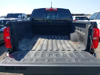 2018 Chevrolet Colorado 4WD Z71 z VIN 1GCGTDEN0J1173420, wystawiony jako IAAI lot #41971813 z przebiegiem 98 499 mil mil oraz . Historia ofert i sprzedaży dostępna na DreamBid. Obrazek 17.