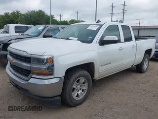 2018 Chevrolet Silverado 1500 LT with VIN 2GCRCREC6J1110773, listed as a IAAI auction lot 42174596 with 136,477 mi miles and . Bid and sale history available at DreamBid. Image 17.