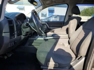 2012 Nissan Titan SV with VIN 1N6BA0EC0CN316317, listed as a Copart auction lot 57576905 with 113,323 mi miles and Salvage title. Bid and sale history available at DreamBid. Image 7.