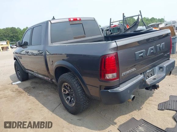 2017 Ram 1500 Rebel with VIN 1C6RR7YT6HS861839, listed as a IAAI auction lot 42407025 with 127,084 mi miles and . Bid and sale history available at DreamBid. Image 3.