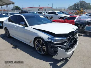 2020 BMW 5 Series M550i xDrive with VIN WBAJS7C0XLCD42738, listed as a IAAI auction lot 42326945 with 50,046 mi miles and . Bid and sale history available at DreamBid. Image 1.