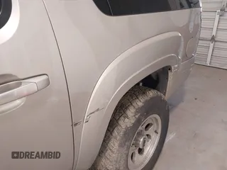 2007 Chevrolet Suburban LTZ z VIN 3GNFC16057G264519, wystawiony jako IAAI lot #41641397 z przebiegiem 235 431 mil mil oraz . Historia ofert i sprzedaży dostępna na DreamBid. Obrazek 15.