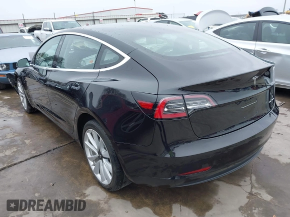 2018 Tesla Model 3 Long Range Battery with VIN 5YJ3E1EB3JF090567, listed as a IAAI auction lot 41568312 with 35,327 mi miles and . Bid and sale history available at DreamBid. Image 3.