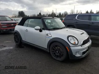 2013 MINI Convertible S with VIN WMWZP3C55DT297215, listed as a Copart auction lot 87995095 with Not provided miles and Salvage title. Bid and sale history available at DreamBid. Image 4.