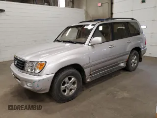 2002 Toyota Land Cruiser z VIN JTEHT05J922018964, wystawiony jako Copart lot #60111015 z przebiegiem 245 890 mil mil oraz Czysty tytuł • Clean title. Historia ofert i sprzedaży dostępna na DreamBid. Obrazek 1.