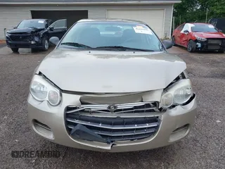 2006 Chrysler Sebring z VIN 1C3EL46X06N236544, wystawiony jako IAAI lot #42289101 z przebiegiem 151 158 mil mil oraz . Historia ofert i sprzedaży dostępna na DreamBid. Obrazek 13.