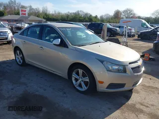 2012 Chevrolet Cruze LT w/2LT with VIN 1G1PG5SC9C7144150, listed as a IAAI auction lot 42113185 with 152,398 mi miles. Bid and sale history available at carsss.com. Image 1.