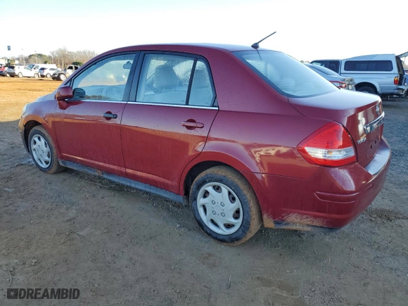 2007 Nissan Versa 1.8 S with VIN 3N1BC11E37L420609, listed as a Copart auction lot 85940874 with 112,342 mi miles and Salvage Title. Bid and sale history available at carsss.com. Image 2.