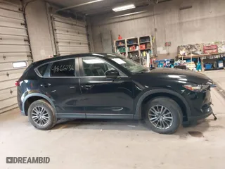 2019 Mazda CX-5 Touring with VIN JM3KFACM7K1568732, listed as a IAAI auction lot 41866736 with 50,753 mi miles. Bid and sale history available at carsss.com. Image 13.