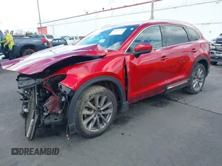 2020 Mazda CX-9 Grand Touring with VIN JM3TCBDY4L0423563, listed as a IAAI auction lot 41829394 with 76,704 mi miles and . Bid and sale history available at DreamBid. Image 21.