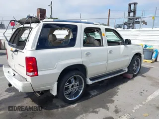 2003 Cadillac Escalade z VIN 1GYEK63N93R319255, wystawiony jako IAAI lot #42371706 z przebiegiem 171 656 mil mil oraz . Historia ofert i sprzedaży dostępna na DreamBid. Obrazek 4.