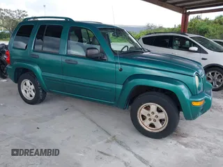 2004 Jeep Liberty Limited with VIN 1J4GK58K94W104382, listed as a IAAI auction lot 40214679 with 143,836 mi miles. Bid and sale history available at carsss.com. Image 3.