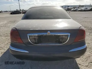2001 Lincoln Continental with VIN 1LNHM97V21Y680964, listed as a Copart auction lot 80640714 with 0 mi miles and Salvage Title. Bid and sale history available at carsss.com. Image 6.