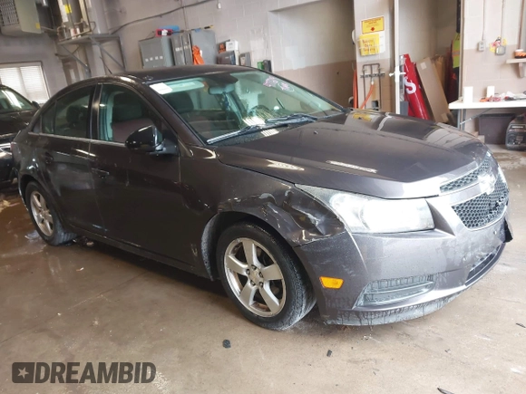 2014 Chevrolet Cruze 1LT with VIN 1G1PC5SBXE7477219, listed as a IAAI auction lot 41970786 with 194,542 mi miles and . Bid and sale history available at DreamBid. Image 1.