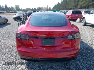 2023 Tesla Model S with VIN 5YJSA1E5XPF516779, listed as a IAAI auction lot 42110737 with 16,465 mi miles and . Bid and sale history available at DreamBid. Image 17.