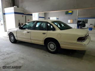 1996 Ford Crown Victoria LX with VIN 2FALP74W1TX152476, listed as a Copart auction lot 47946925 with 131,008 mi miles and Salvage Title. Bid and sale history available at carsss.com. Image 2.