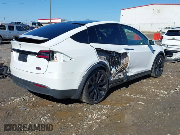 2022 Tesla Model X Plaid z VIN 7SAXCBE64NF352928, wystawiony jako IAAI lot #41406070 z przebiegiem 38 175 mil mil oraz . Historia ofert i sprzedaży dostępna na DreamBid. Obrazek 4.