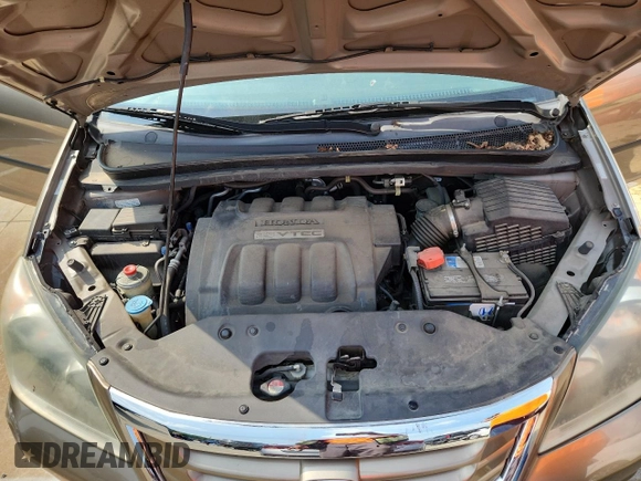 2008 Honda Odyssey LX z VIN 5FNRL38218B052952, wystawiony jako Copart lot #60907585 z przebiegiem 82 876 mil mil oraz Szkoda całkowita • Salvage title. Historia ofert i sprzedaży dostępna na DreamBid. Obrazek 12.