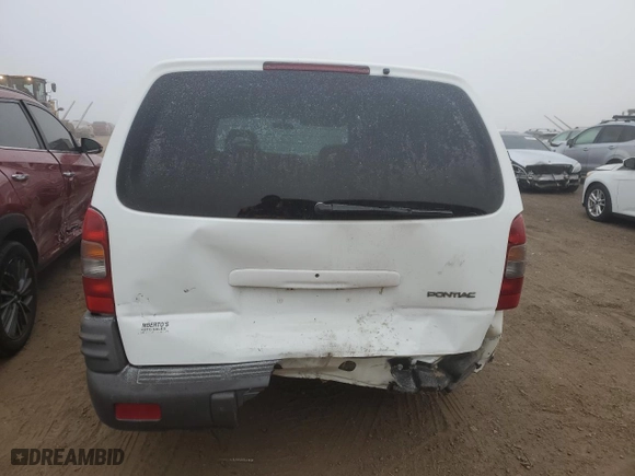 2000 Pontiac Montana with VIN 1GMDX03EXYD337067, listed as a Copart auction lot 87148504 with 184,644 mi miles and Salvage Title. Bid and sale history available at carsss.com. Image 6.