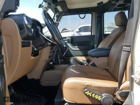 2016 Jeep Wrangler Unlimited Rubicon z VIN 1C4HJWFGXGL236560, wystawiony jako Copart lot #57528355 z przebiegiem 64 634 mil mil oraz Szkoda całkowita • Salvage title. Historia ofert i sprzedaży dostępna na DreamBid. Obrazek 7.