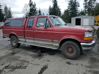 1993 Ford F-150 with VIN 1FTEX14H6PKB86844, listed as a Copart auction lot 52012705 with 127,784 mi miles and Salvage title. Bid and sale history available at DreamBid. Image 4.