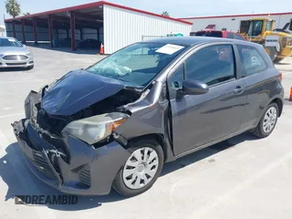 2015 Toyota Yaris L with VIN VNKJTUD33FA053390, listed as a IAAI auction lot 42100665 with 207,939 mi miles and . Bid and sale history available at carsss.com. Image 2.