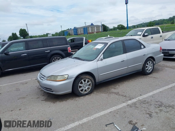 2002 Honda Accord SE с VIN 1HGCG56712A088663, выставлен на аукционе IAAI как лот 42520639 с пробегом 2 304 496 миль миль и . История ставок и продаж доступна на DreamBid. Изображение 2.