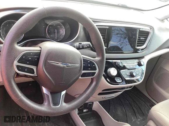 2017 Chrysler Pacifica Touring with VIN 2C4RC1DG5HR764942, listed as a IAAI auction lot 42255421 with 64,381 mi miles and . Bid and sale history available at DreamBid. Image 18.