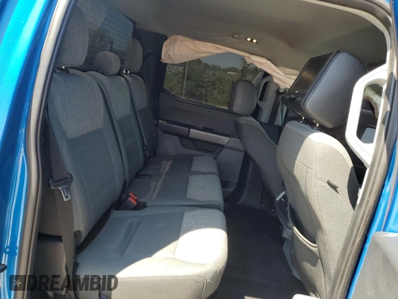 2021 Ford F-150 XL with VIN 1FTFW1E50MFA32128, listed as a Copart auction lot 56423385 with 88,965 mi miles and Salvage title. Bid and sale history available at DreamBid. Image 11.