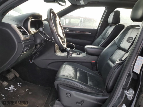 2014 Jeep Grand Cherokee Overland with VIN 1C4RJFCM4EC318893, listed as a Copart auction lot 42163465 with 153,678 mi miles and Clean Title. Bid and sale history available at carsss.com. Image 7.