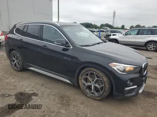 2018 BMW X1 xDrive28i z VIN WBXHT3C30J5L30276, wystawiony jako Copart lot #58903045 z przebiegiem 86 778 mil mil oraz Szkoda całkowita • Salvage title. Historia ofert i sprzedaży dostępna na DreamBid. Obrazek 4.