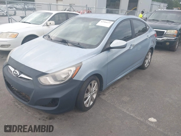 2013 Hyundai Accent GLS with VIN KMHCU4AE8DU583303, listed as a IAAI auction lot 42504235 with 113,992 mi miles and . Bid and sale history available at DreamBid. Image 2.